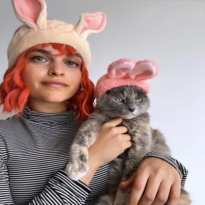 Actress Eve Harlow with her pet cat during Halloween